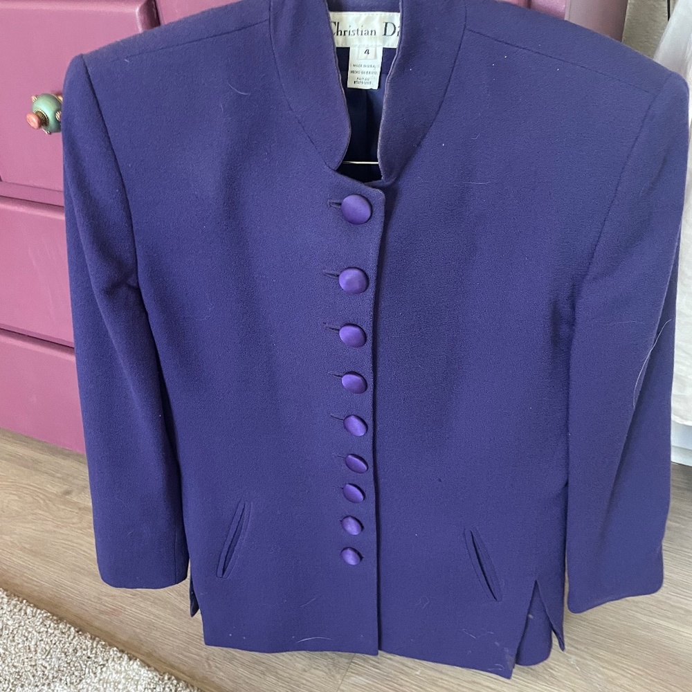 Purple wool suit. Jacket silk buttons. Skirt over knee